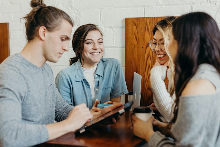 A small group in conversation during a discussion circle